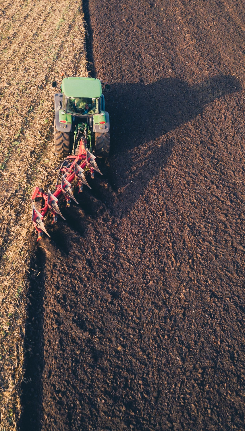 Tractor Discing Field